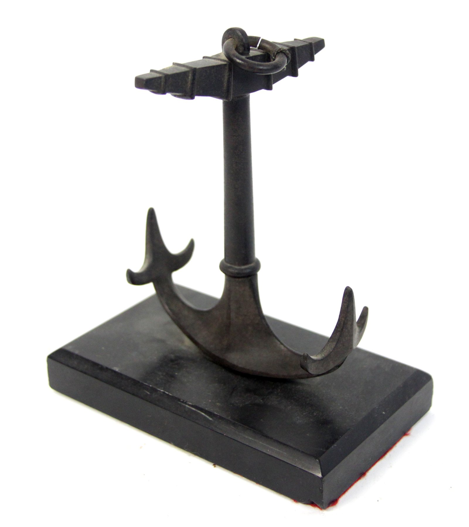 Appraisal: A bronze anchor paperweight on polished slate base cm wide