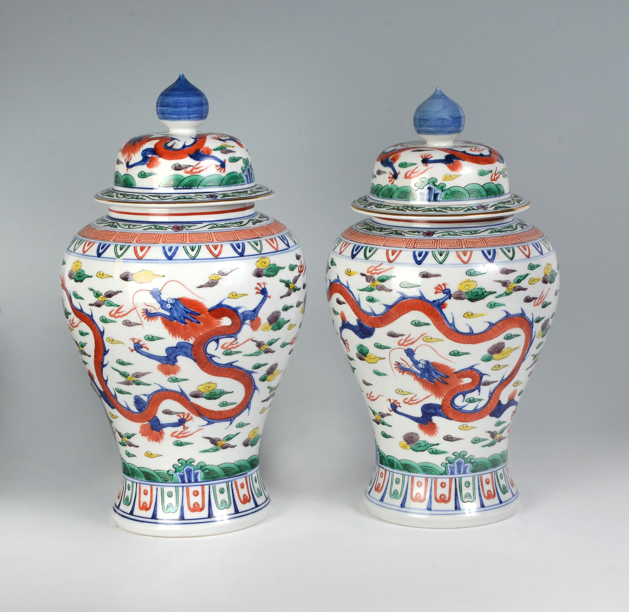 Appraisal: PAIR OF CHINESE DOUCAI LIDDED DRAGON VASES Chinese Doucai lidded