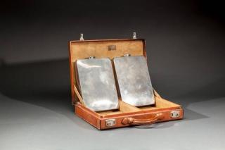 Appraisal: Two Prohibition Era Flasks in Leather Case by by in