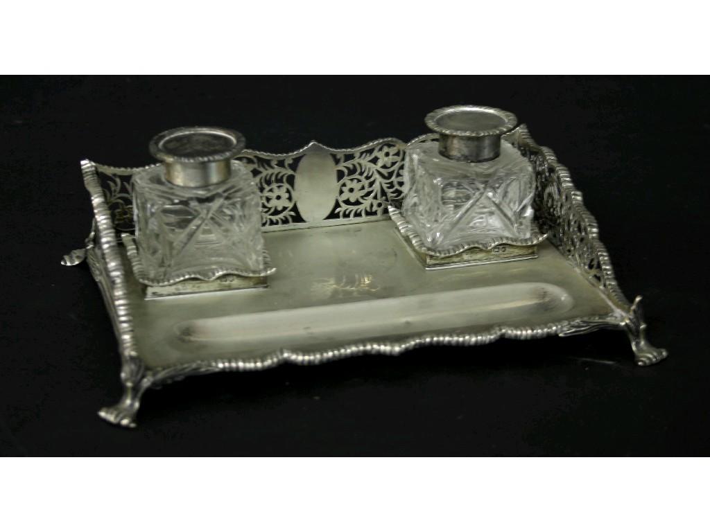 Appraisal: Edwardian silver inkstand the raised wavy back pierced with scrolling