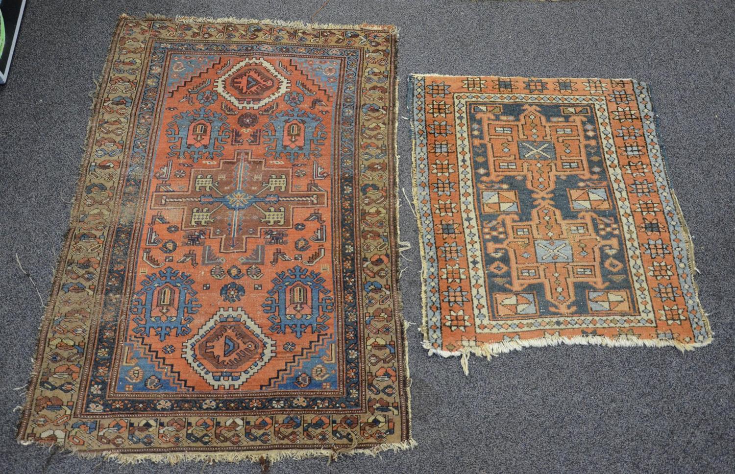 Appraisal: Turkish throw rugs x and x wear and losses to