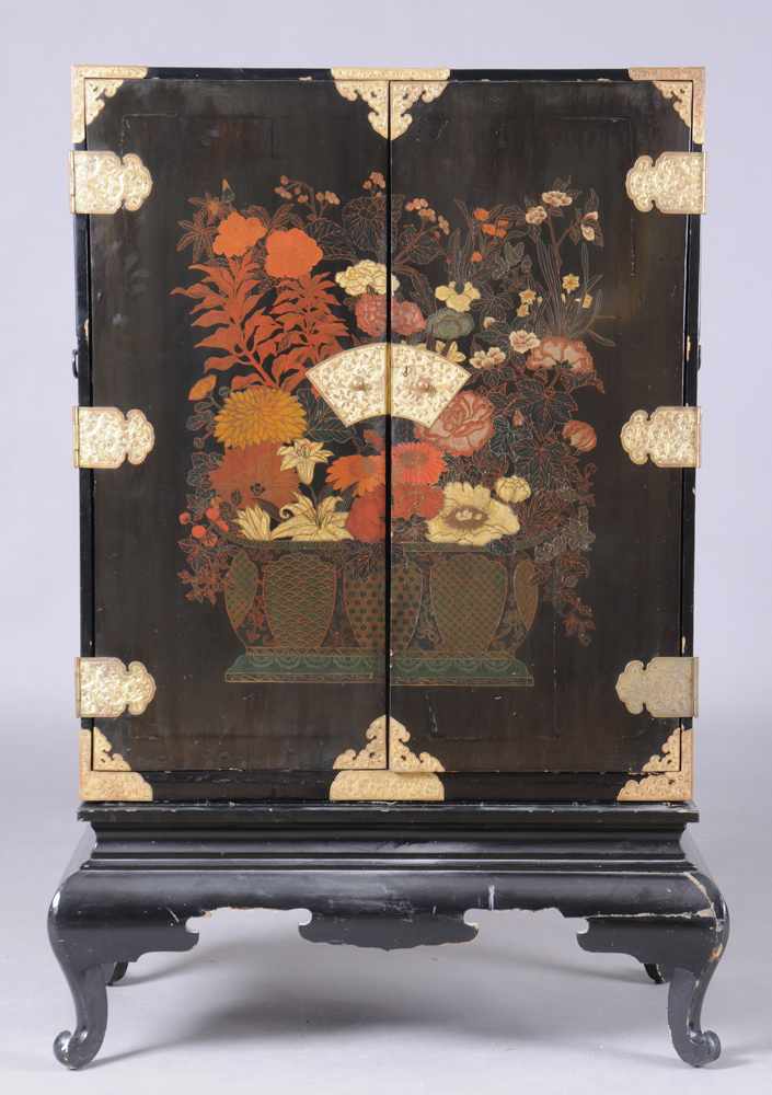 Appraisal: JAPANESE GILT-METAL MOUNTED BLACK LACQUER TALL CABINET ON STAND The