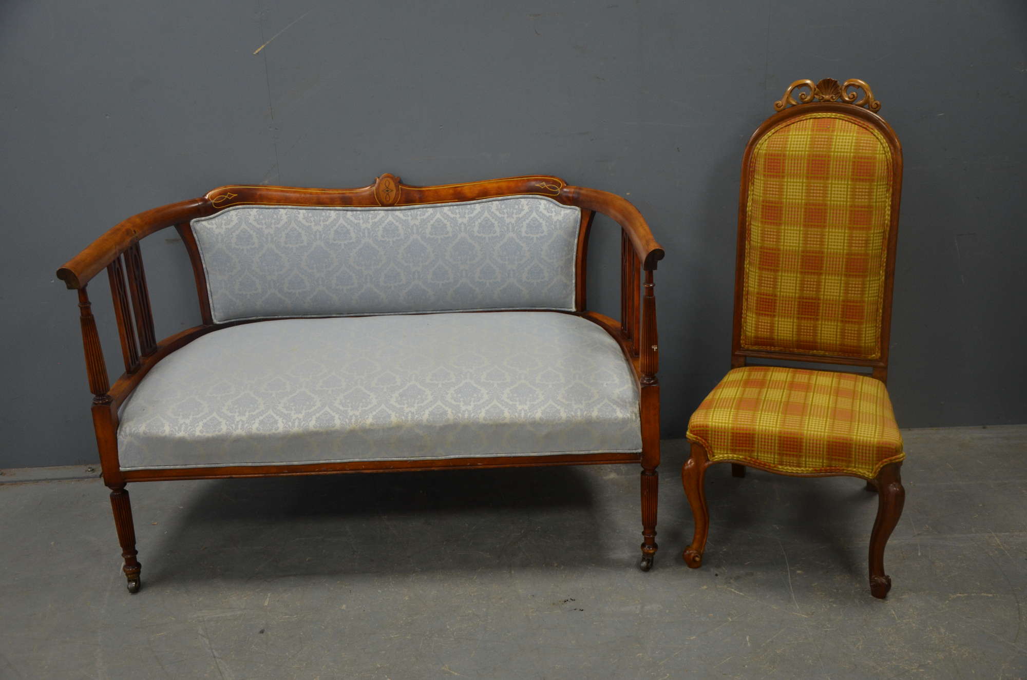 Appraisal: A mahogany sofa together with a rosewood and mahogany chair