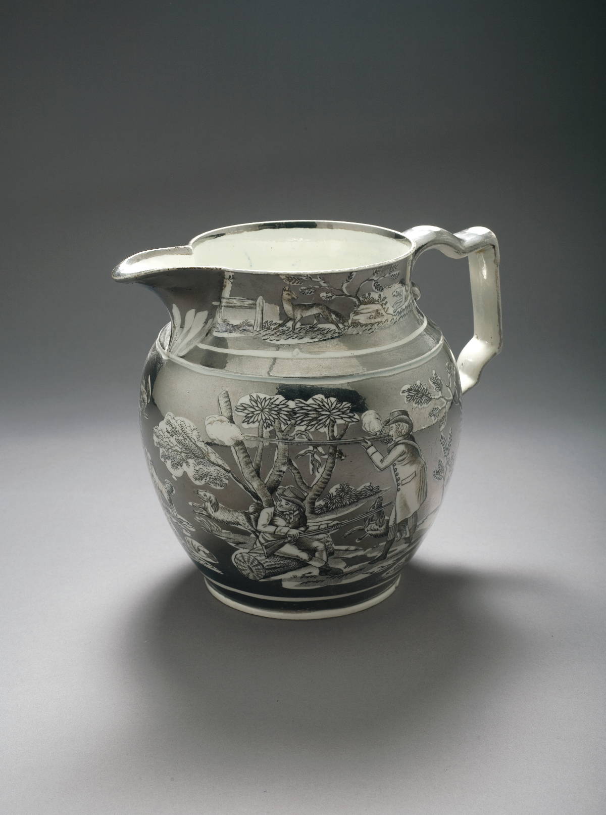 Appraisal: SWANSEA OR STAFFORDSHIRE SILVER RESIST LUSTRE SPORTING JUG CIRCA Resisted