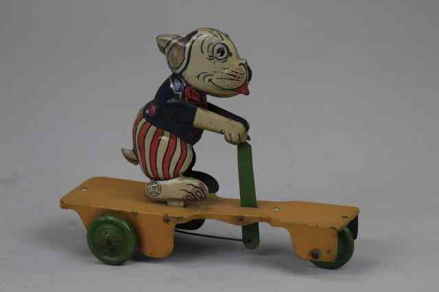 Appraisal: BONZO STYLED SCOOTER PULL TOY Chein lithographed tin unauthorized version