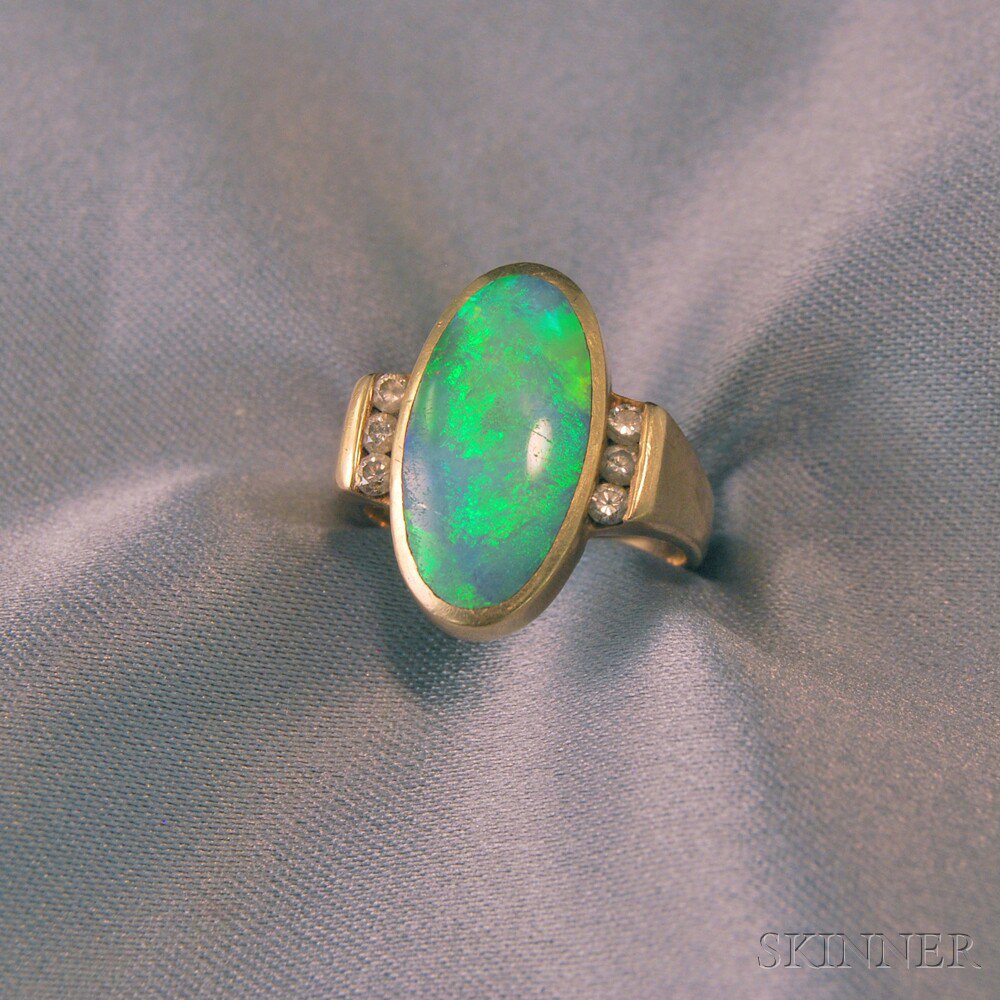 Appraisal: kt Gold Opal Doublet Ring the oval bezel-set opal measuring