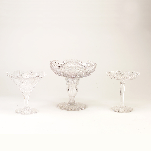 Appraisal: Large bowl on stand and three cut-glass footed vessels Minor