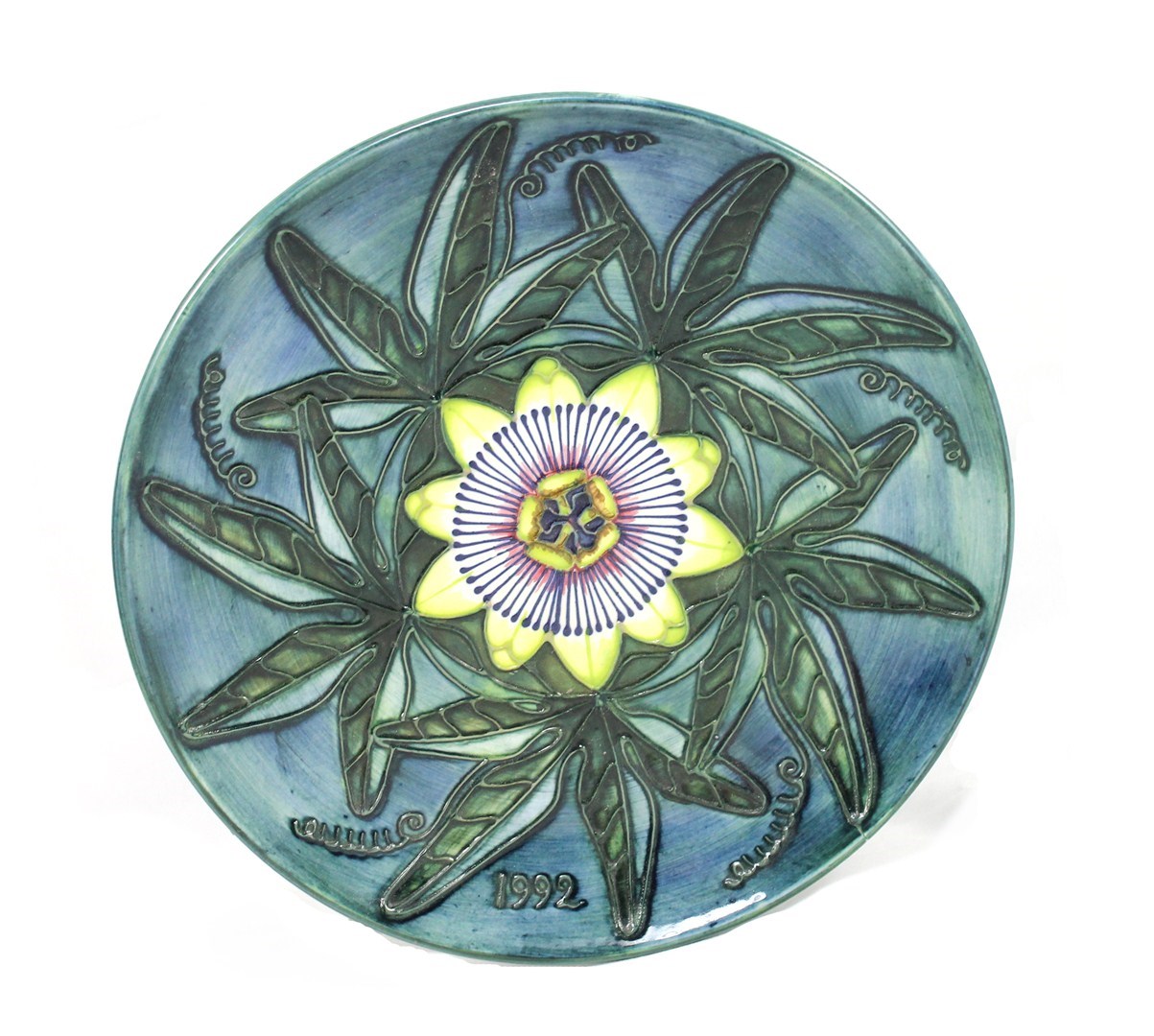 Appraisal: A Moorcroft green ground floral bowl cm diameter and a