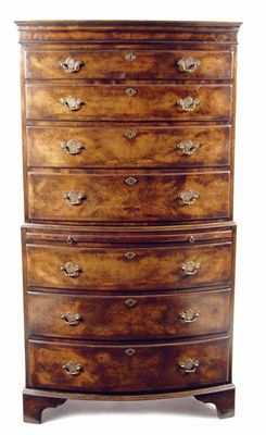 Appraisal: A walnut bowfront chest on chest in th century style