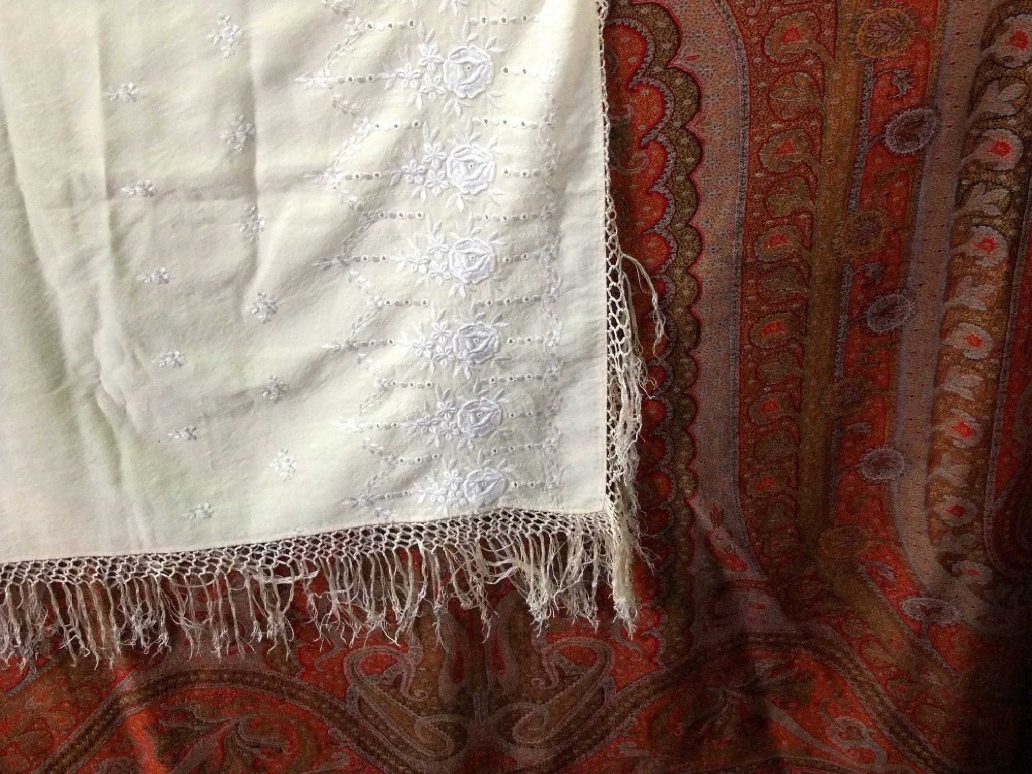 Appraisal: A paisley wool shawl principally in a red green and