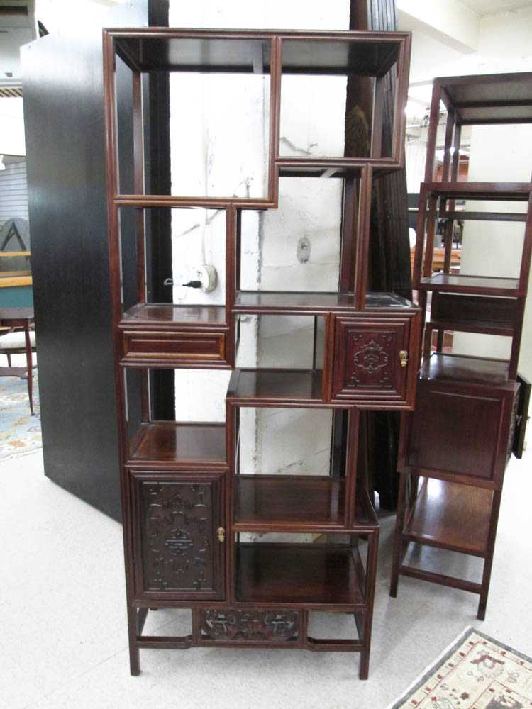 Appraisal: CHINESE ROSEWOOD ETAGERE having nine levels of open shelves and