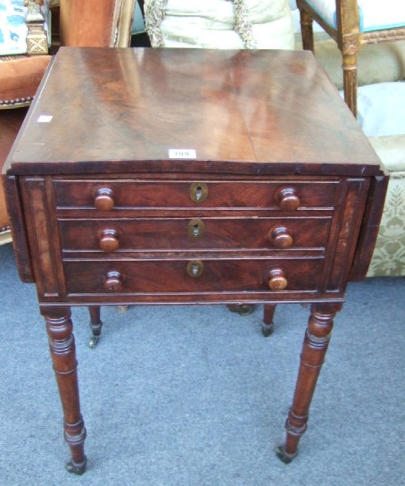 Appraisal: A Regency mahogany drop flap table with a pair of