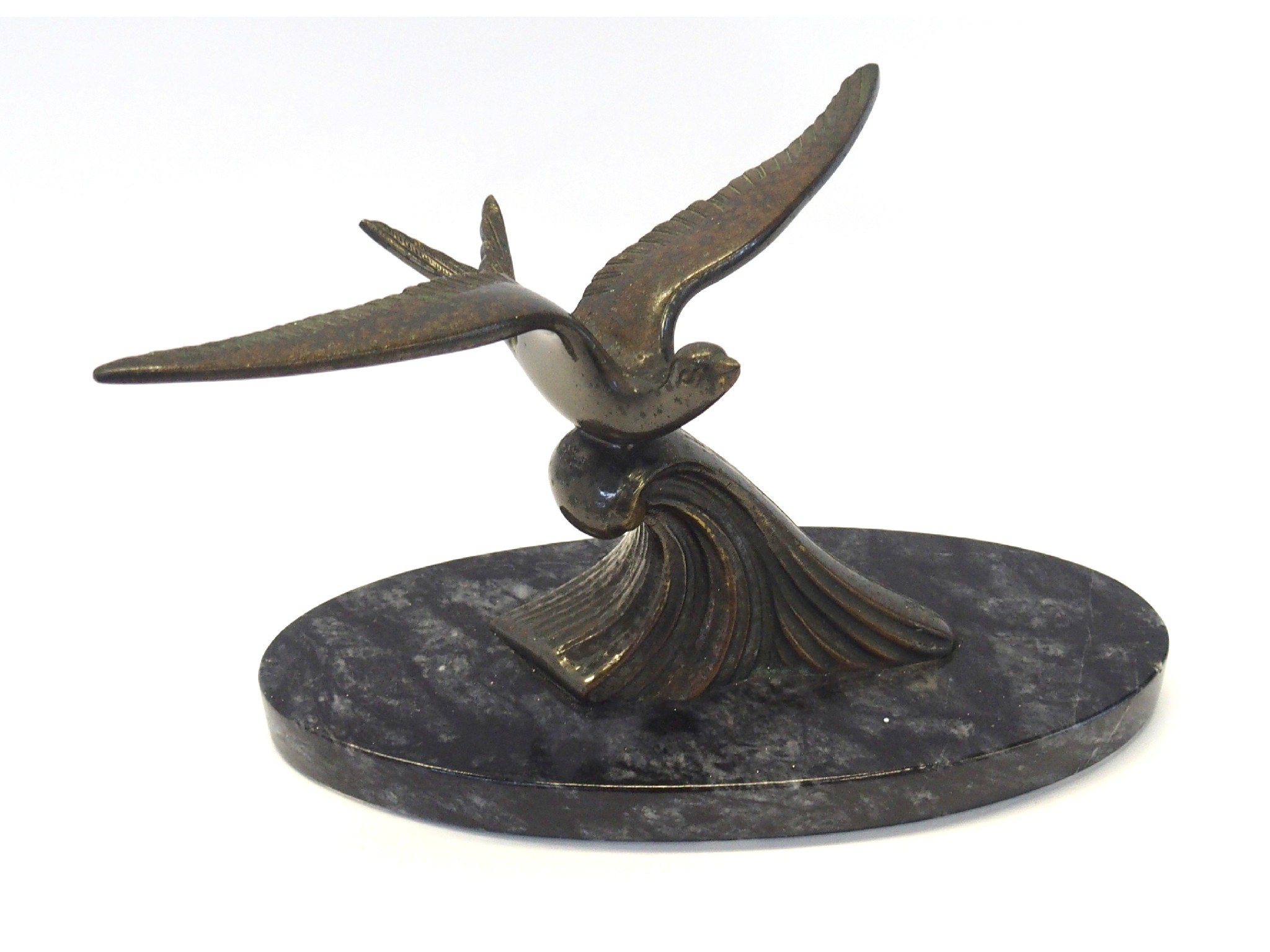 Appraisal: Cast bronze figure of a bird on black marble base