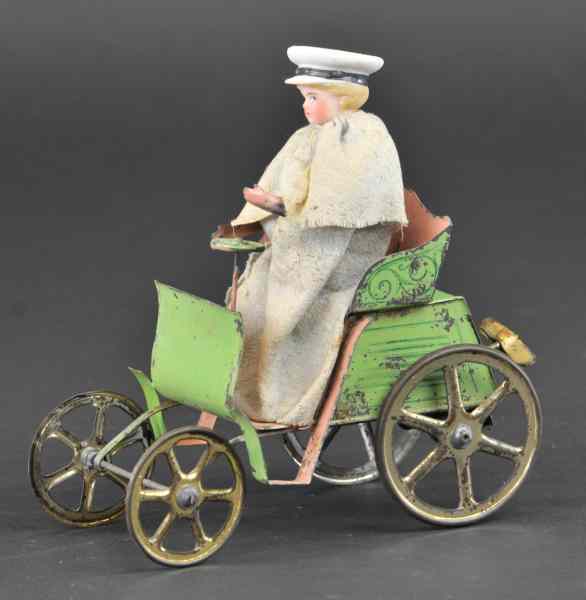 Appraisal: HORSELESS CARRIAGE WITH BISQUE DRIVER c 's attributed to a