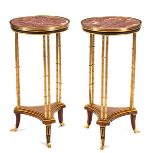 Appraisal: A Pair of French Gilt Bronze Marble-Top Gu ridons Manner