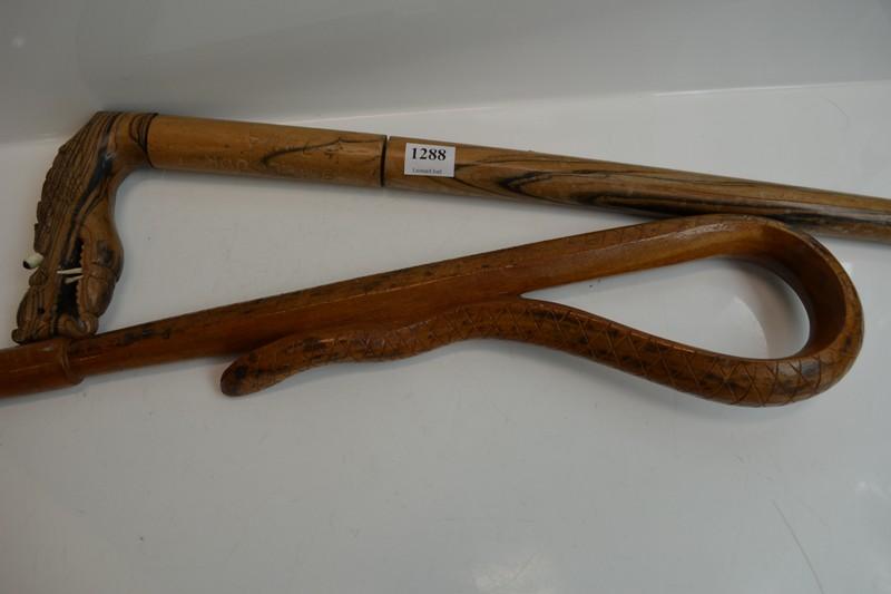 Appraisal: TWO WALKING STICKS ONE FROM UGANDA AND ONE FROM JAVA