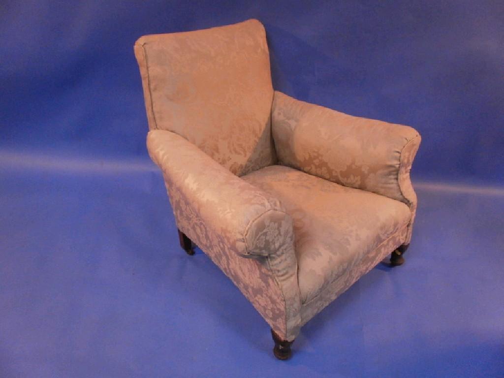 Appraisal: A deep upholstered Victorian scroll armchair with short cabriole legs