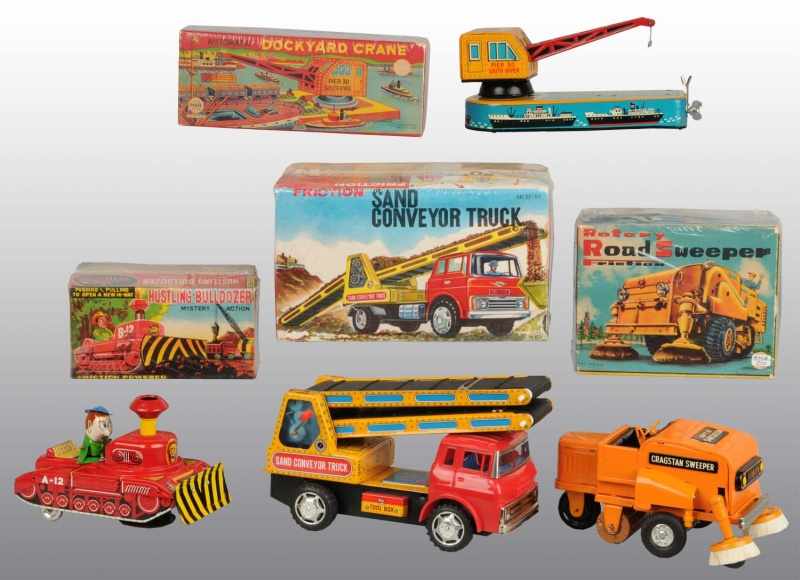 Appraisal: Lot of Tin Litho Construction Toys Description Japanese Working Includes