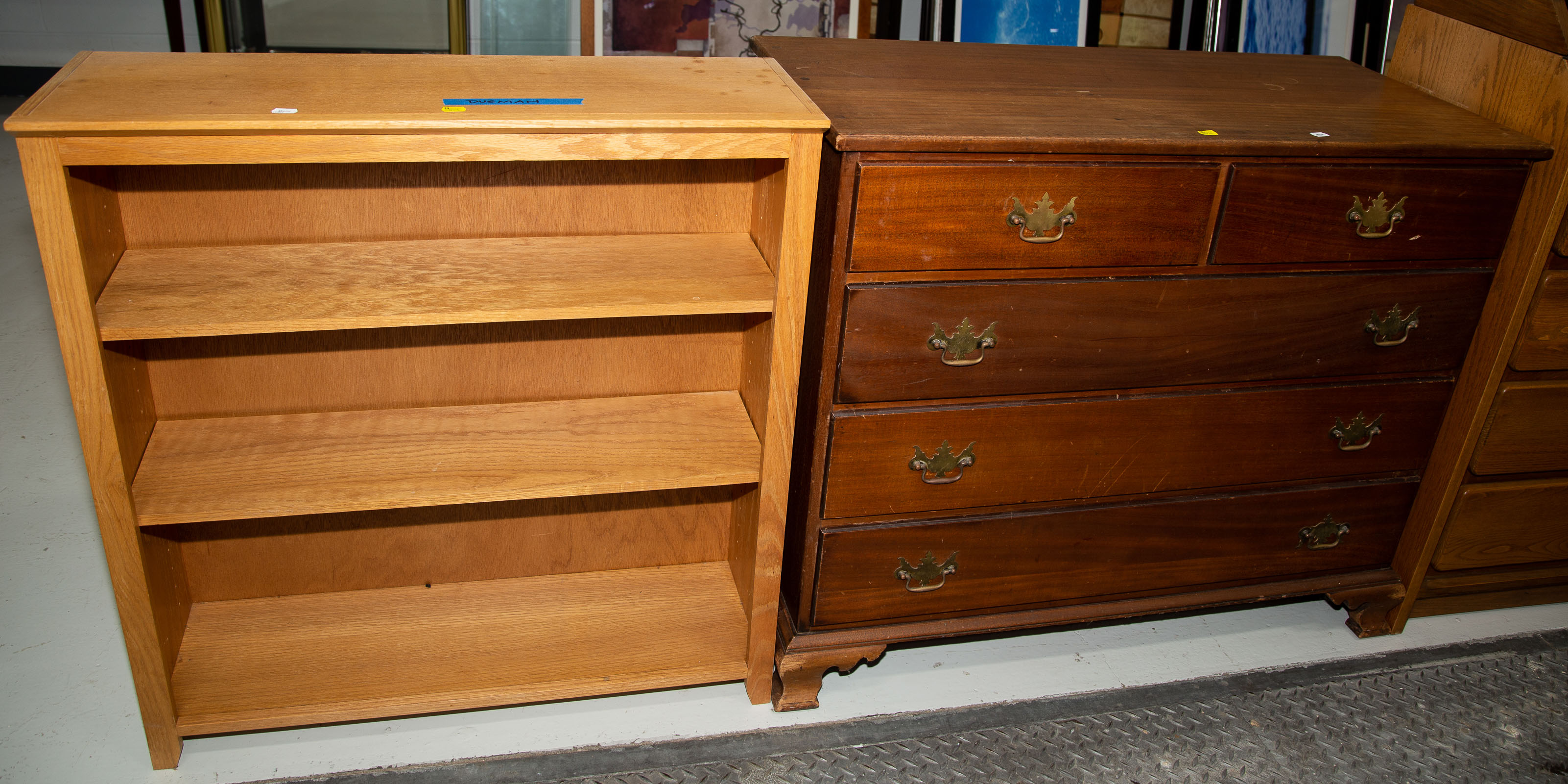 Appraisal: MAHOGANY CHEST OF DRAWERS MODERN OAK BOOKCASE Comprising a Chippendale