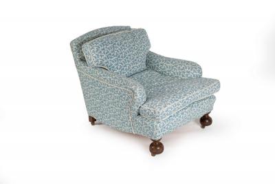 Appraisal: A Howard style deep-seated armchair fitted loose cushions and upholstered