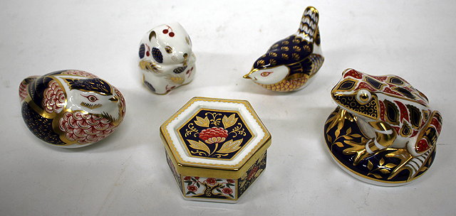 Appraisal: FOUR VARIOUS ROYAL CROWN DERBY PAPERWEIGHTS complete with boxes consisting