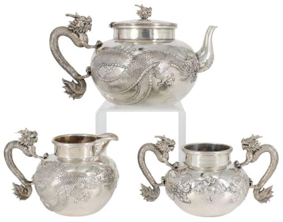 Appraisal: lot of Chinese Export silver tea service repousse dragons pursuing