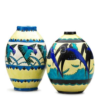 Appraisal: BOCH FRERES Two crackleware vases decorated with birds Belgium ca