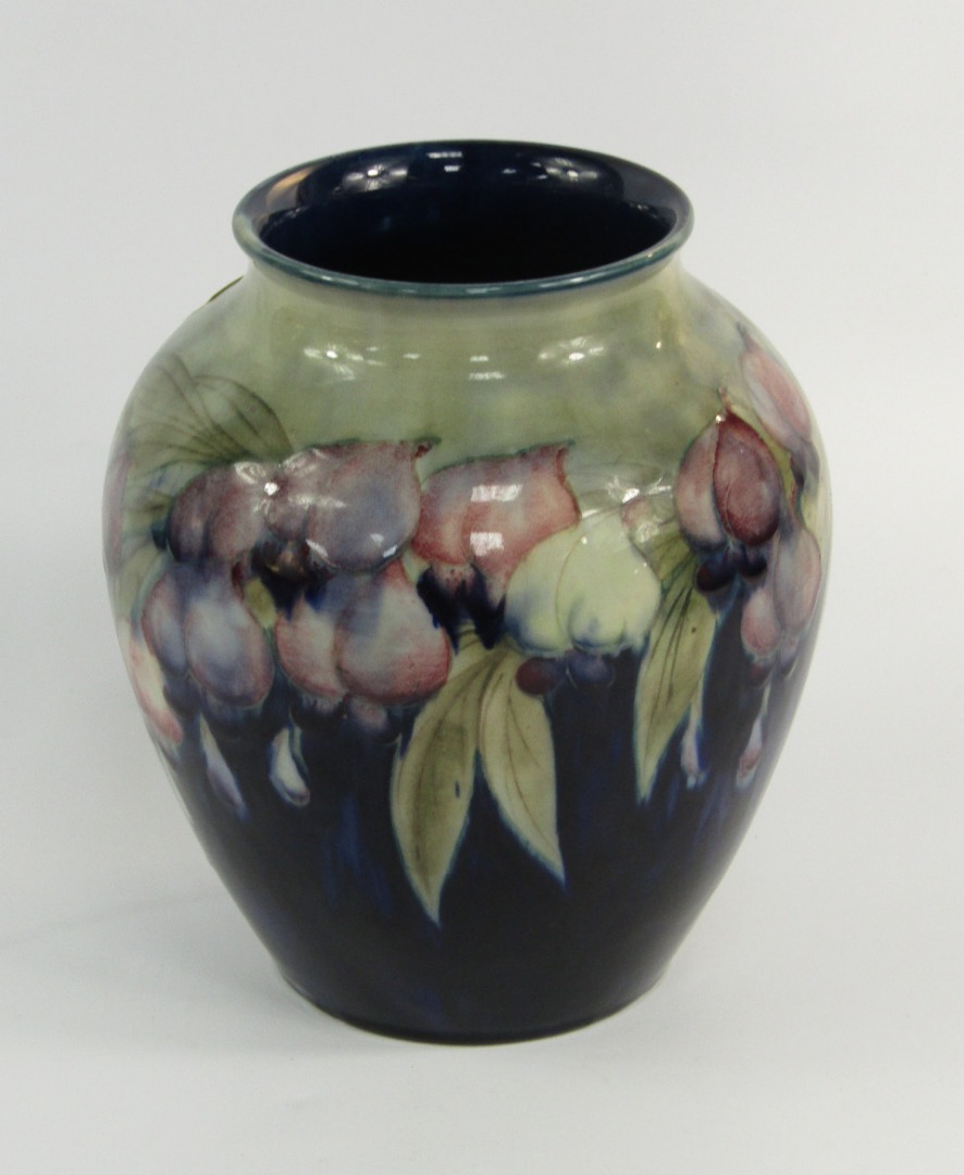 Appraisal: A Moorcroft pottery vase decorated in the Wisteria pattern shouldered