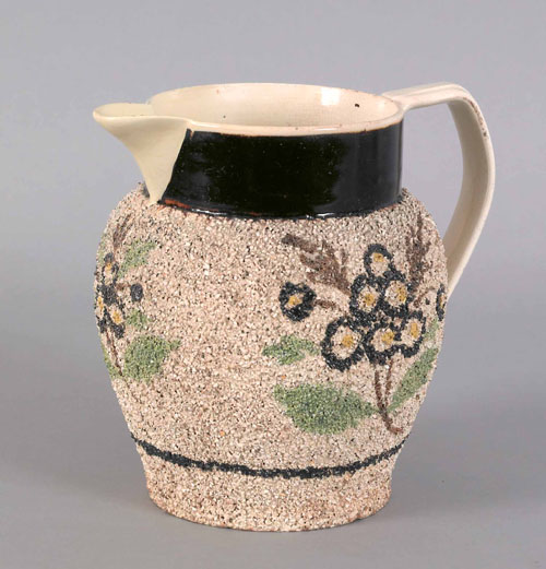 Appraisal: Sand mocha pitcher with floral decoration h