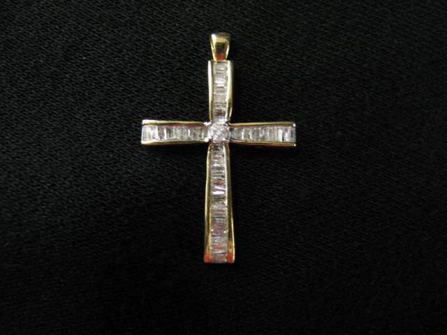 Appraisal: Diamond Cross Pendant center round diamond surrounded by baguette channel