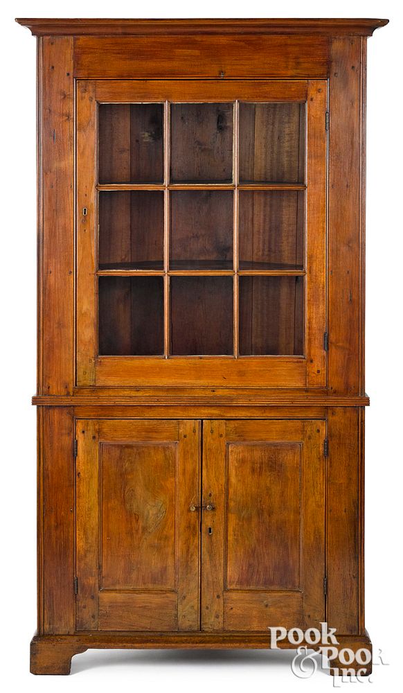 Appraisal: Virginia walnut one-piece corner cupboard Virginia walnut one-piece corner cupboard