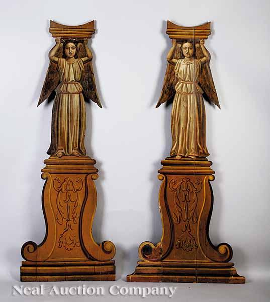 Appraisal: A Pair of Antique Carved and Polychromed Theatrical Appliqu s