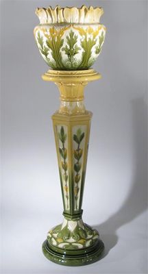 Appraisal: A Leeds Art Pottery jardiniere and stand model no modelled