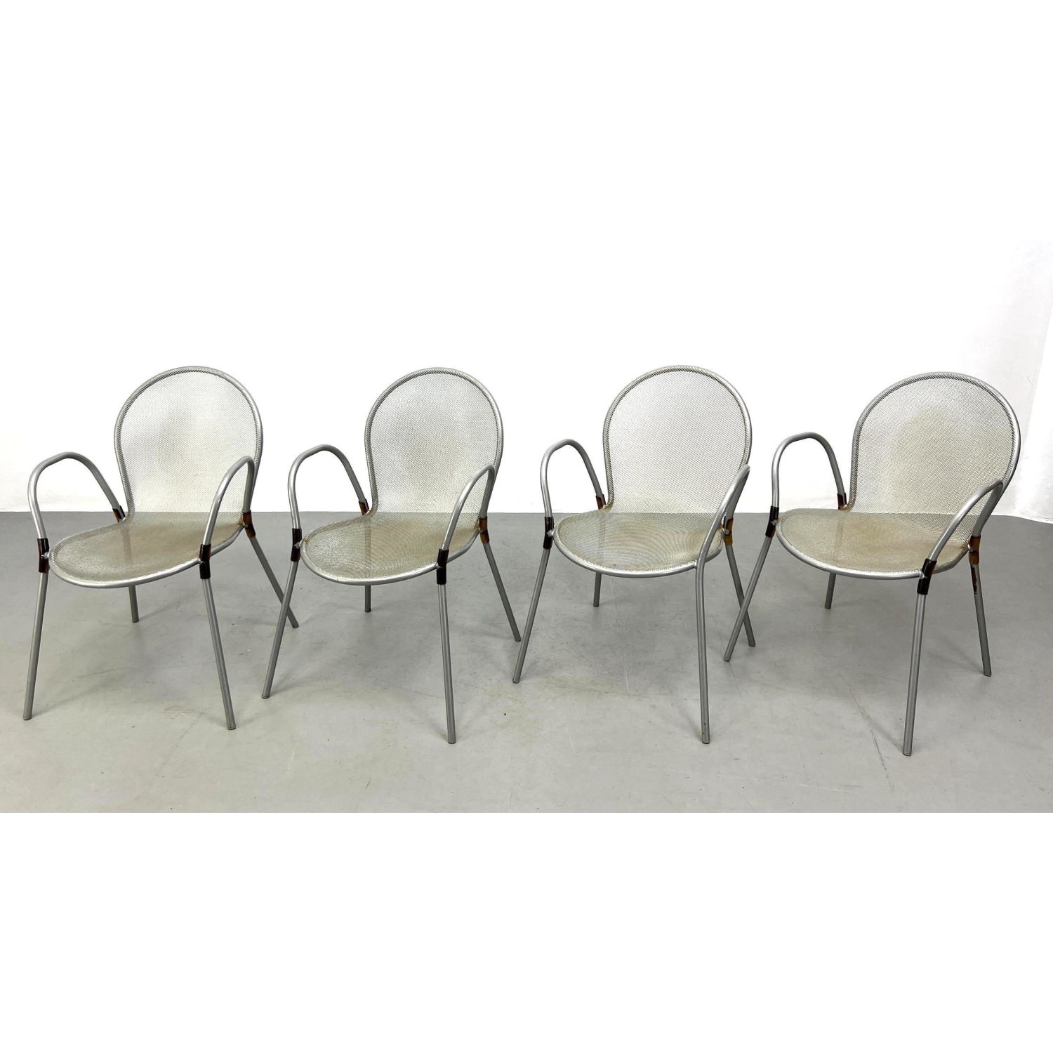 Appraisal: Set Outdoor Dining Chairs Metal Tube Frames with Mesh Frames