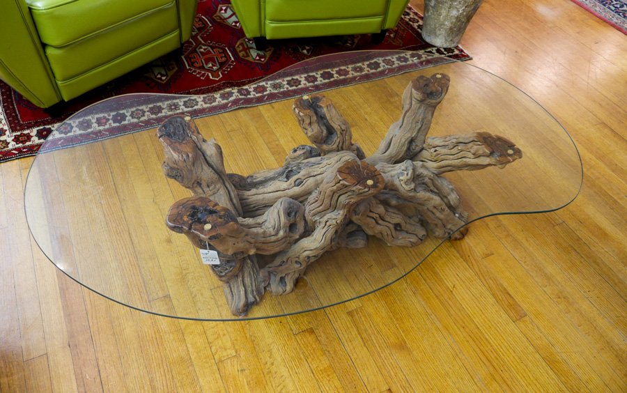 Appraisal: GRAPEVINE GLASS TOP COFFEE TABLE Based constructed from retired California