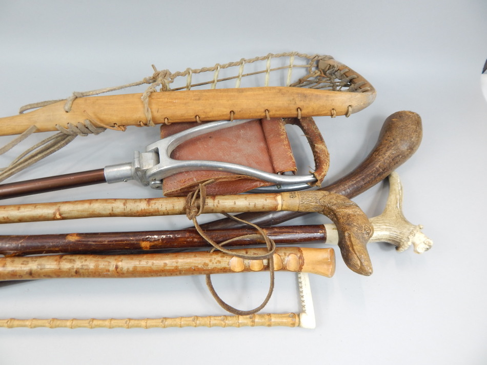 Appraisal: A quantity of walking sticks etc to include an example