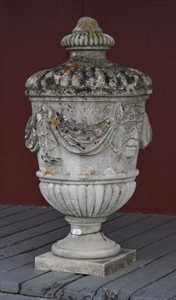 Appraisal: FOUR PORTLAND STONE URN FINIALS The bodies on socles and