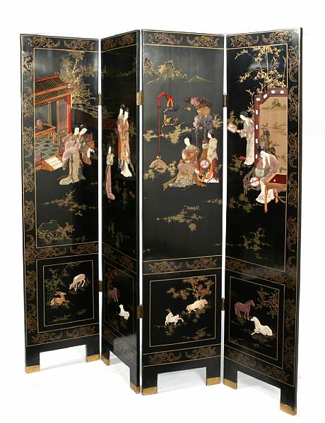 Appraisal: A black lacquer ground wood floor screen with ivory colored