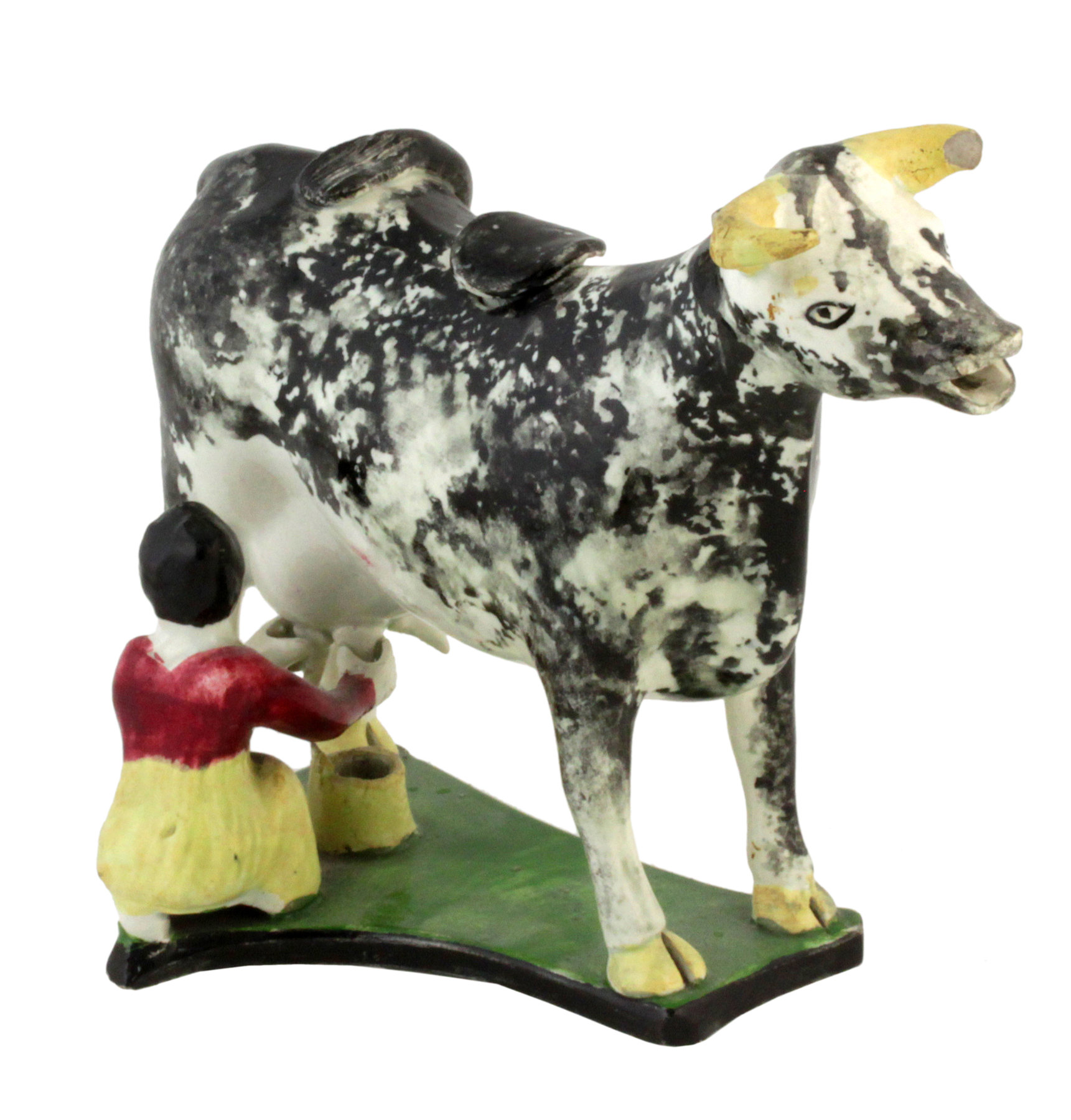 Appraisal: An th Century Prattware cow creamer with green painted base