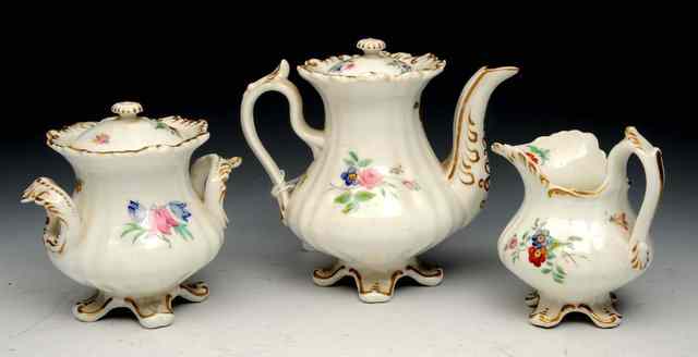 Appraisal: A GRAINGERS WORCESTER THREE PIECE FLORAL DECORATED CHILD'S COFFEE SET