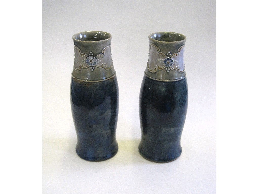 Appraisal: Pair of Royal Doulton stoneware vases with floral decoration