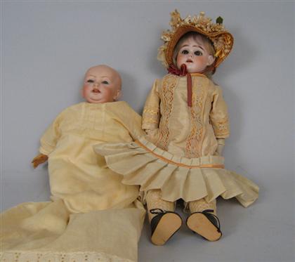 Appraisal: Two dolls The first with bisque head and composite body