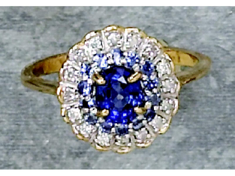 Appraisal: SAPPHIRE AND DIAMOND RING k yellow gold ring set with