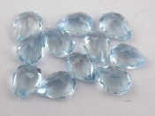 Appraisal: A quantity of loose polished pear shaped blue topaz approx