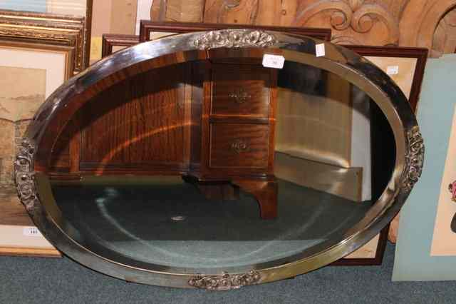 Appraisal: A 'S SILVERED OVAL WALL MIRROR with bevelled edge x