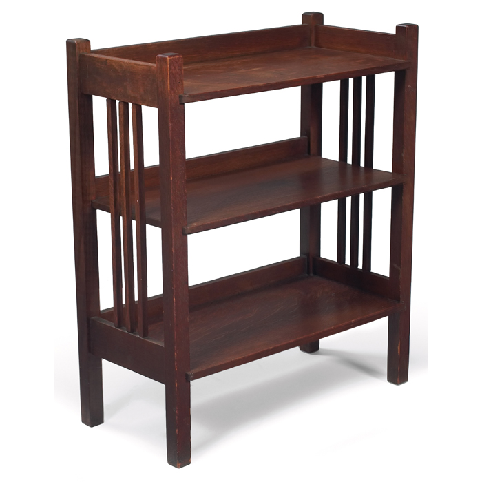 Appraisal: Stickley Brothers magazine stand three shelves supported by spindled sides