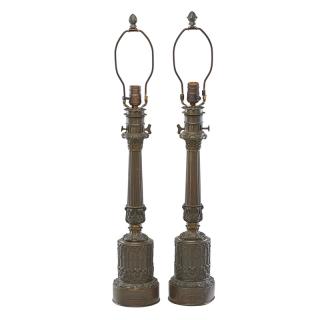 Appraisal: PAIR OF FRENCH CAST METAL TABLE LAMPS Reeded columnar shaft