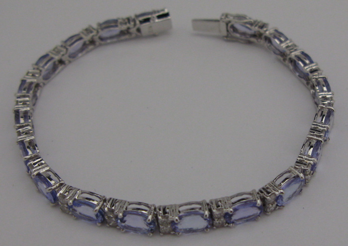 Appraisal: TANZANITE DIAMOND AND FOURTEEN KARAT WHITE GOLD BRACELET inches in