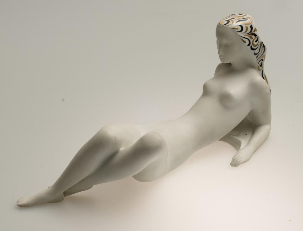 Appraisal: ROYAL DUX FIGURE OF A RECLINING NUDE the beauty in