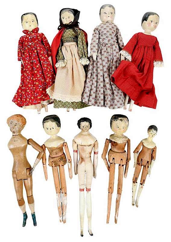 Appraisal: Nine Antique Carved Wood Dolls American German th th century